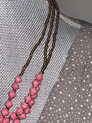 3-strand pink beaded necklace closeup