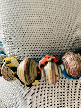 closeup Multicolor "Sezibwa" necklace on mannikin